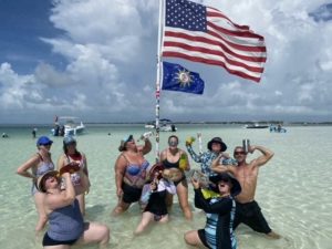 a group of people on a beach