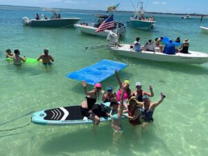 a group of people swimming in a body of water